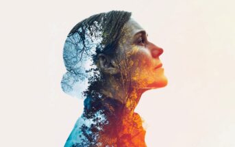A double exposure image of a woman in profile, looking upward, blended with silhouettes of bare tree branches and warm yellow-orange light, creating a thoughtful and artistic effect.