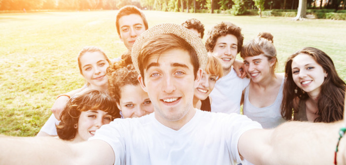 teenagers taking selfie