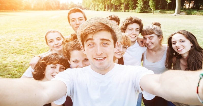 teenagers taking selfie