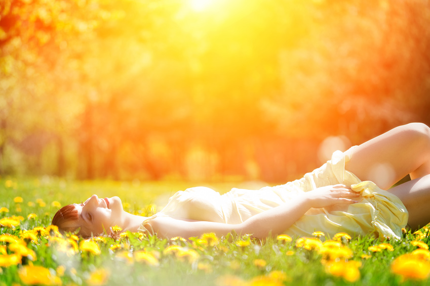 woman lying in grass