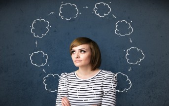 woman surrounded by thought bubbles in a loop