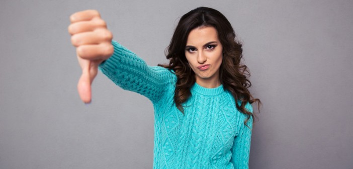 woman with thumbs down