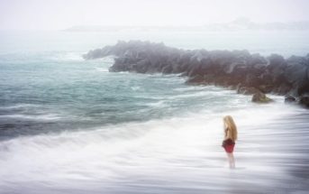 woman on stormy beach