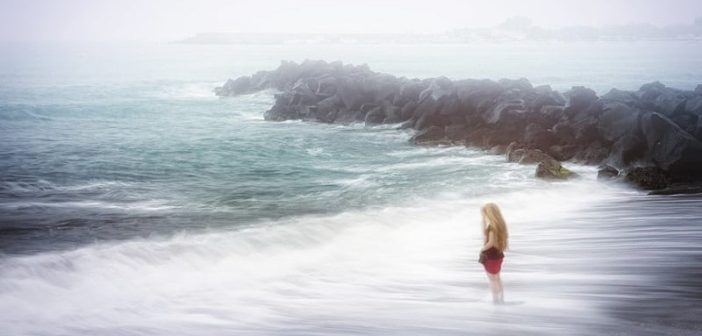woman on stormy beach