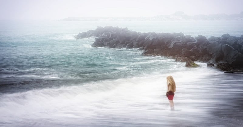 woman on stormy beach