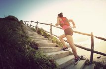 woman running up steps - illustrating not giving up