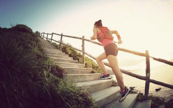 woman running up steps