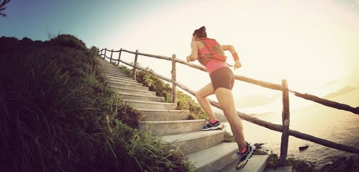 woman running up steps - illustrating not giving up