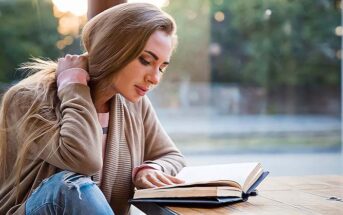 introvert in coffee shop with book