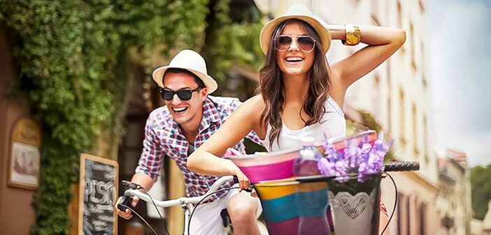 happy looking couple on bikes
