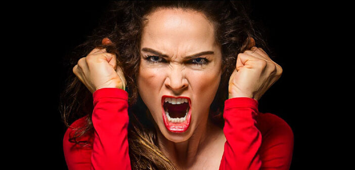 angry woman with clenched fists
