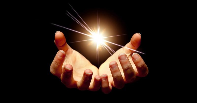 hands holding light - concept of lightworker