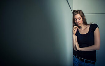 young woman with troubles on her mind signifying emotional pain