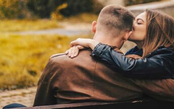 couple in love sitting on bench