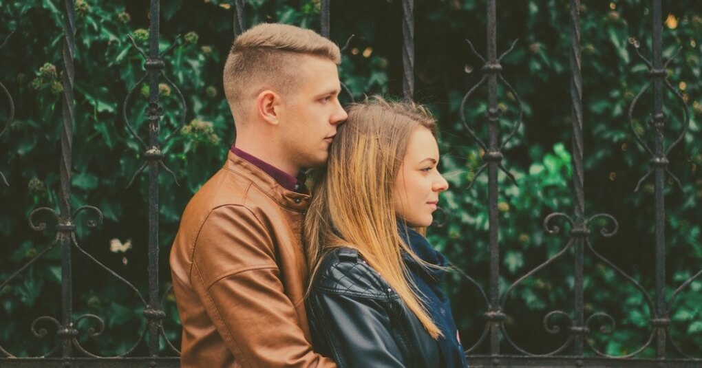young couple in side profile view