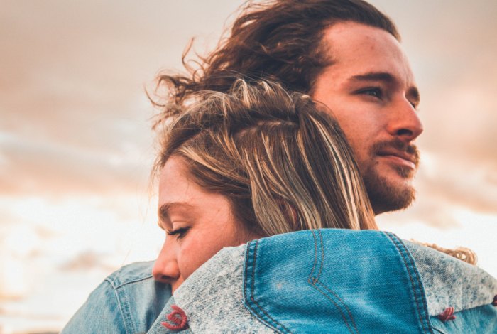 couple hugging outside