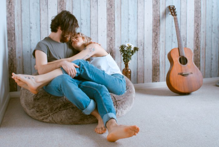 couple sitting on chair together