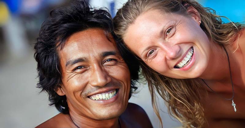 man and woman smiling and showing platonic love