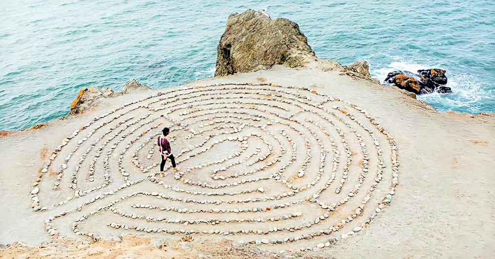 woman in pebble maze