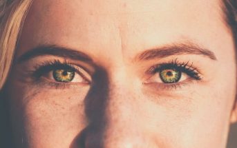 closeup of young woman with green eyes - signifying an Alpha empath