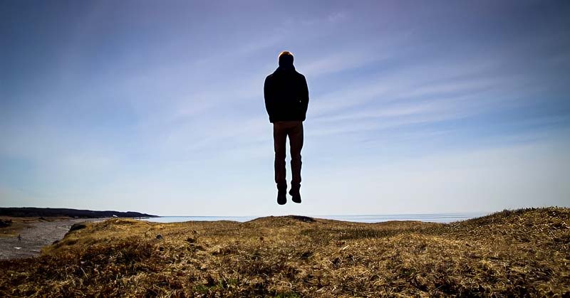 man jumping in air to show passion for something