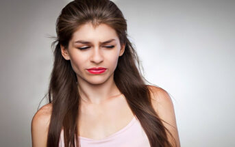 woman with judgmental look on her face