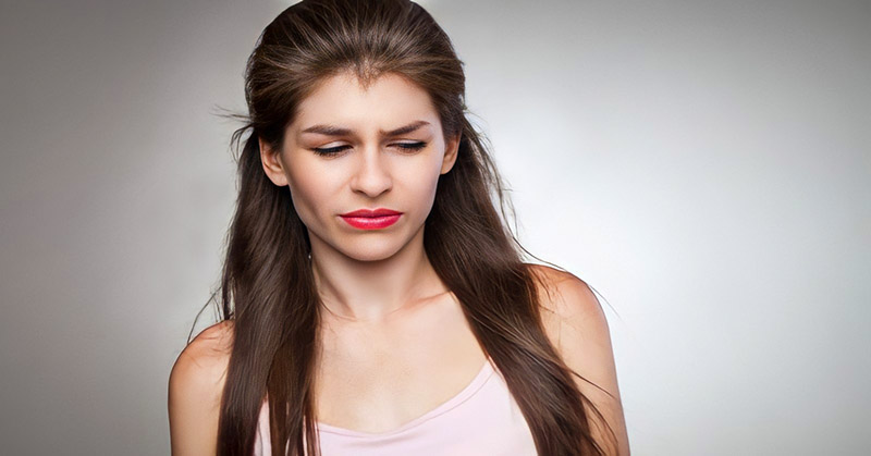 woman with judgmental look on her face