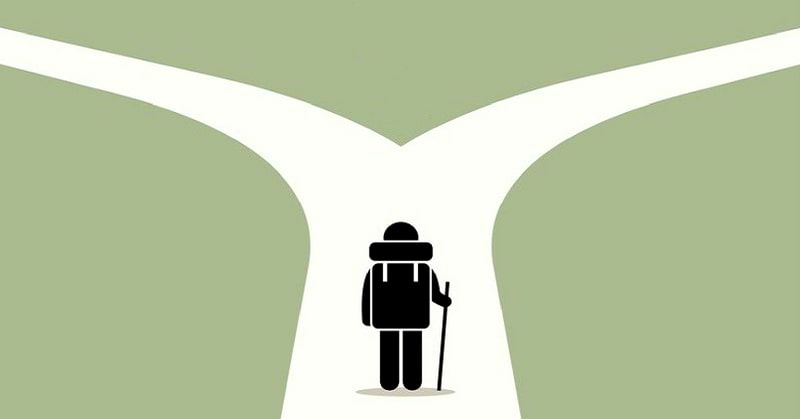 illustration of person at crossroads - symbolising making a decision