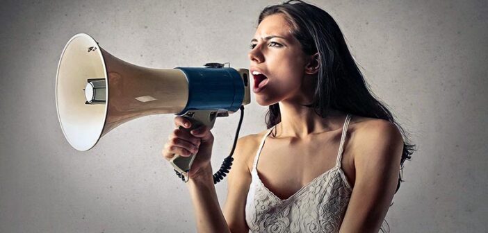 woman with megaphone indicating attention-seeking behavior