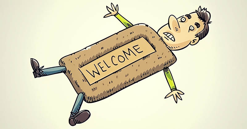 cartoon image of a man as a doormat illustrating being too nice