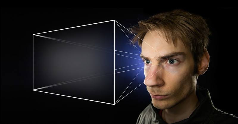 a man using visualization techniques with projection coming out of his eyes
