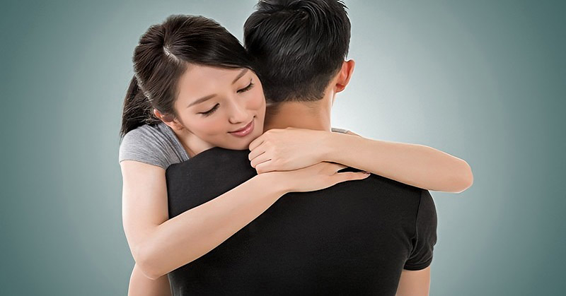 clingy girl hugging boyfriend tightly