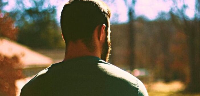 why men pull away - man looking into the distance