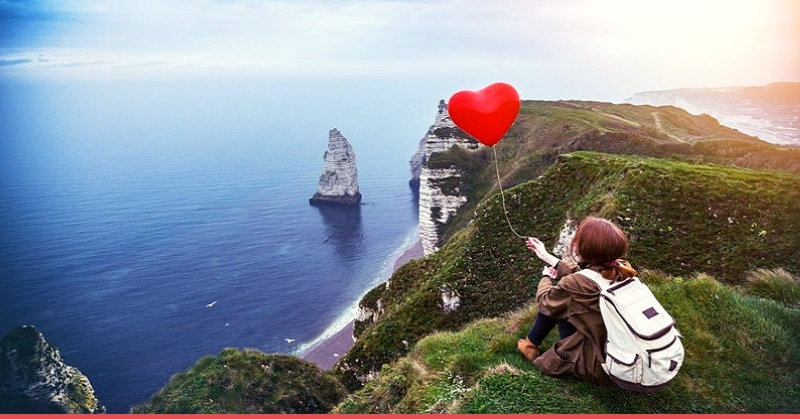 A lady holding a heart-shaped balloon https://www.aconsciousrethink.com/10091/never-been-in-relationship-dated/