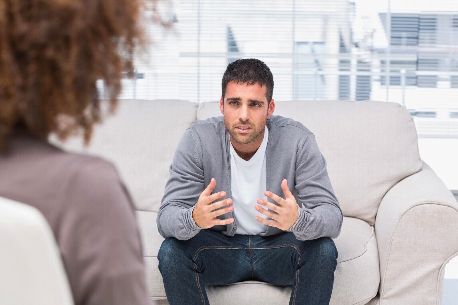 man talking to a therapist