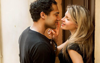 man and woman about to kiss illustrating a rebound relationship