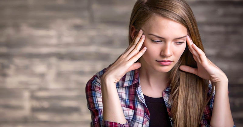 young woman looking stressed - illustrating coping skills