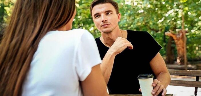 bored man on a date showing that he's not into you