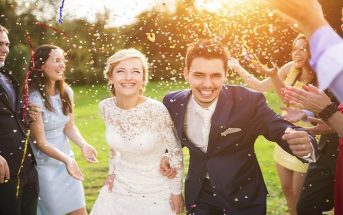 married couple on wedding day - why do people get married?