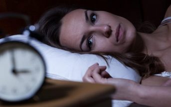 insomniac woman awake at 3am - how to function on no sleep