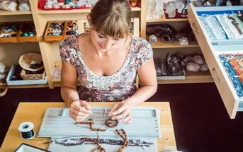 woman making a necklace illustrating finding a hobby