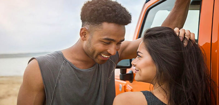 guy leaning in toward girl illustrating body language of attraction