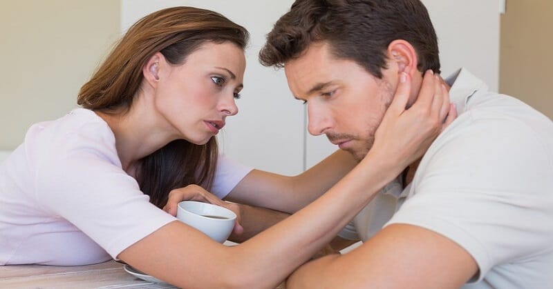 woman showing comfort to stressed boyfriend
