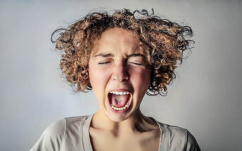 an irritable introvert woman screaming