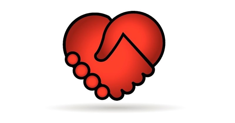 illustration of two hands shaking that form the shape of a red heart - illustrating compromise in a relationship