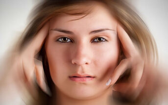 woman with fingers on face with blurred background - illustrating not knowing what to do