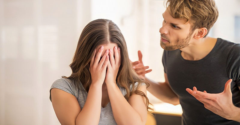 a husband showing anger and irritation toward his wife