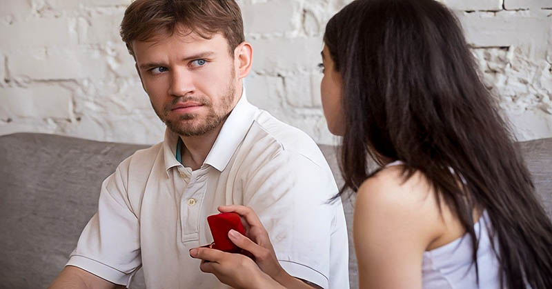 woman proposing to her boyfriend, but he doesn't want to get married