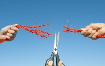 person with scissors cutting a rope held by two people - symbolizing cutting ties with toxic family