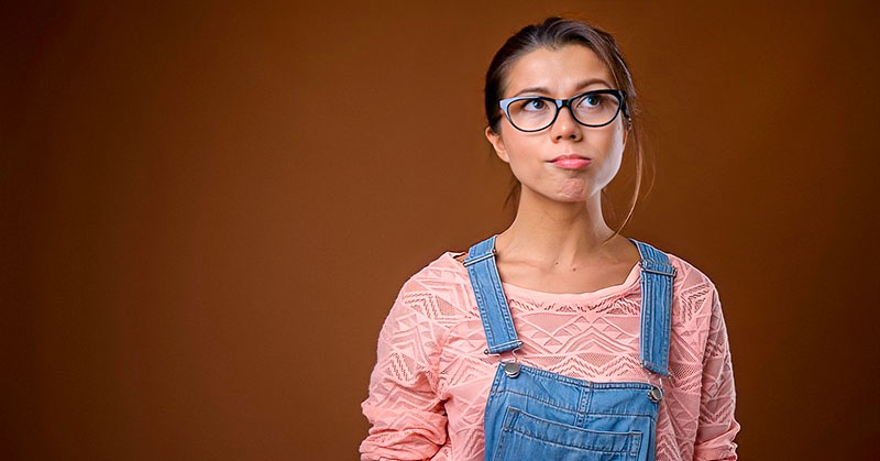 nerdy looking woman who doesn't know how to have fun